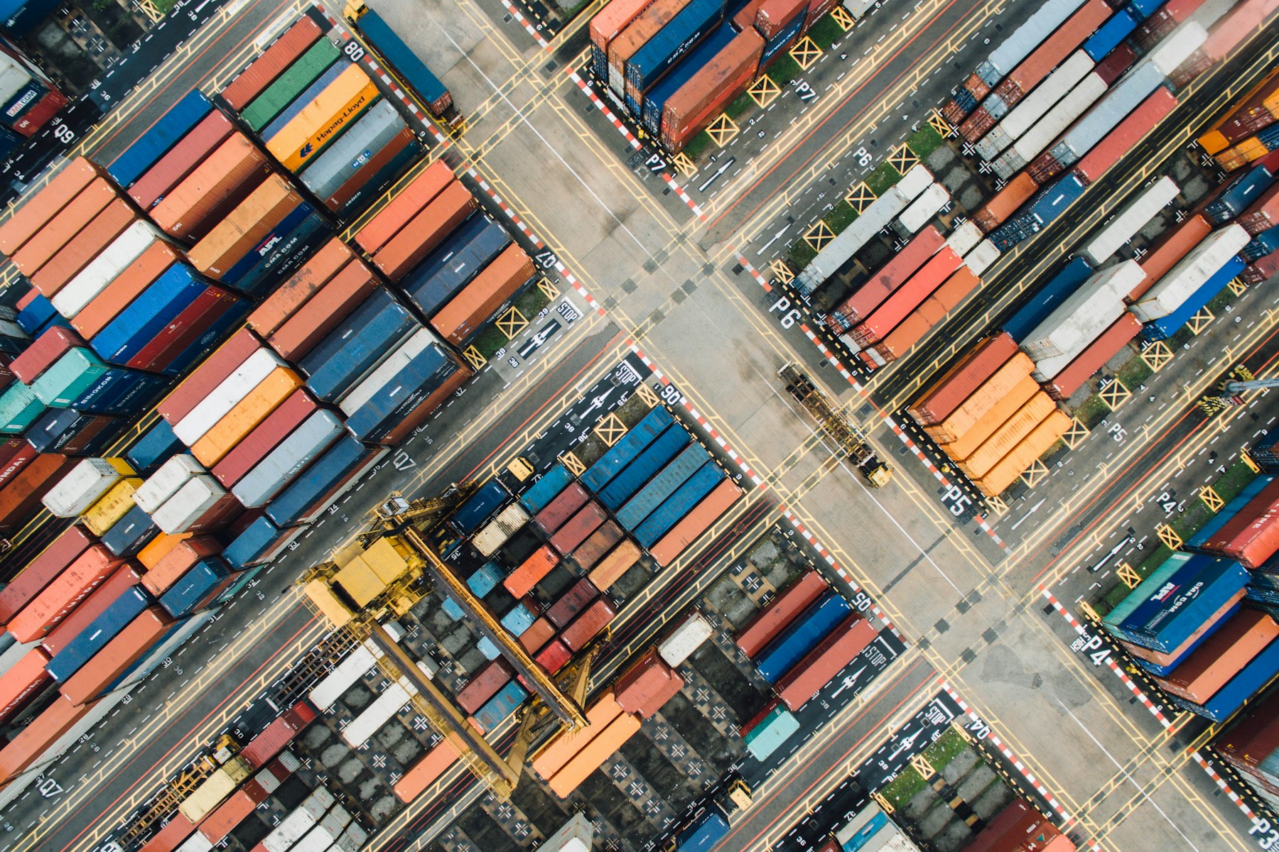 Illustrative aerial view of containers at an international logistics terminal